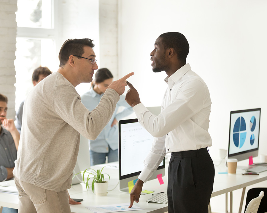 Two co-workers yelling at each other