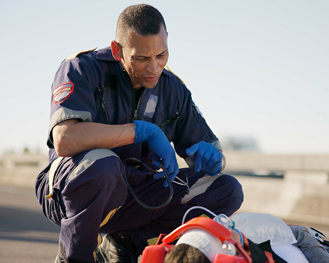 EMT helping an injured person